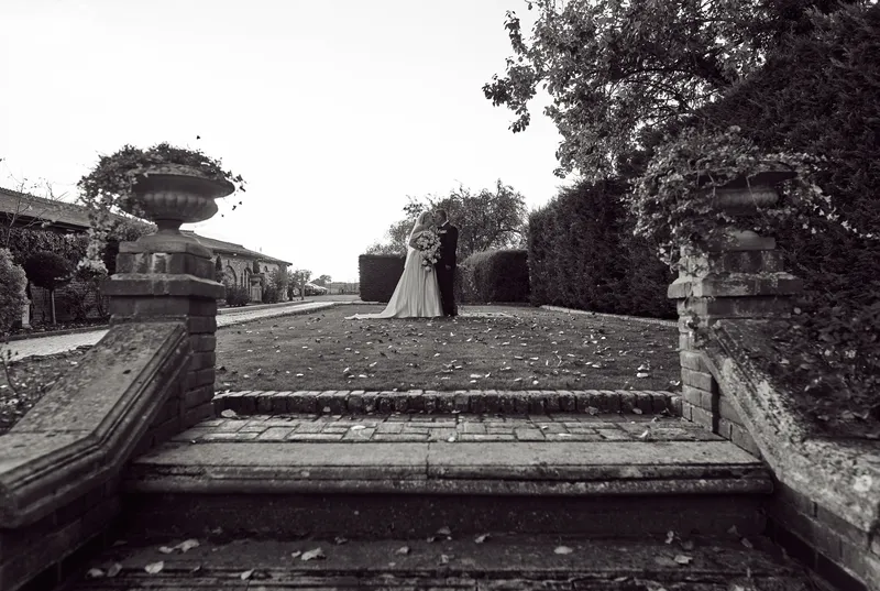 Black and white couple portrait in the grounds of Friern Manor