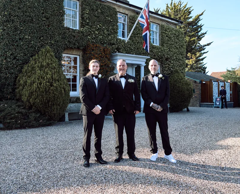 Groom and groomsmen on the forecourt at Friern Manor