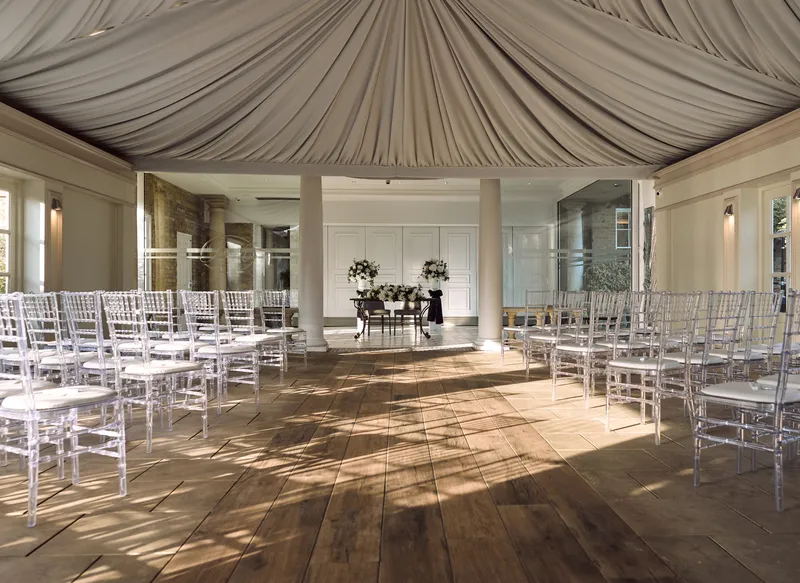 Draped ceremony room set up at Friern Manor