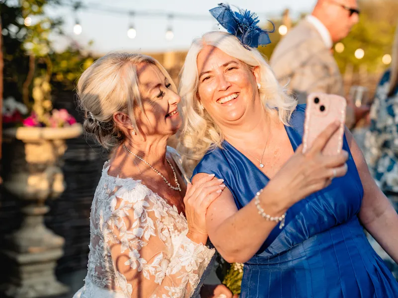 Guests taking a selfie at The Orchard