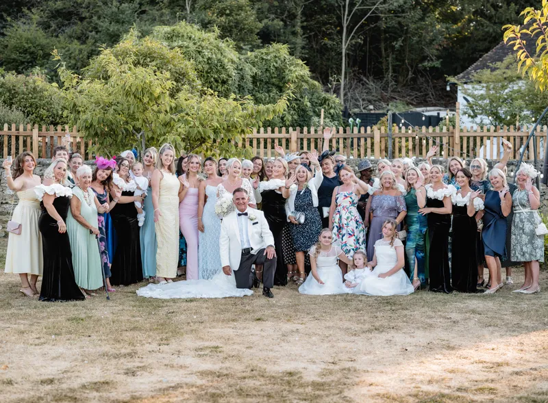 Large group photo of all the guests at The Orchard