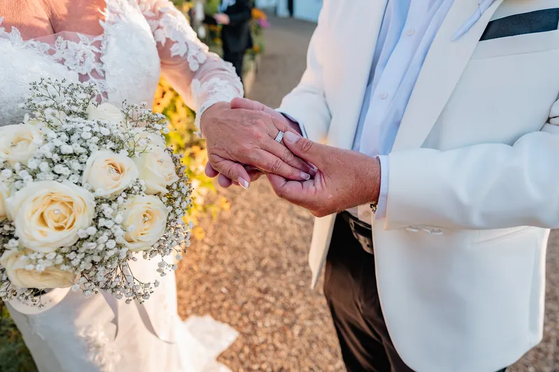 Ring exchange during the ceremony at The Orchard