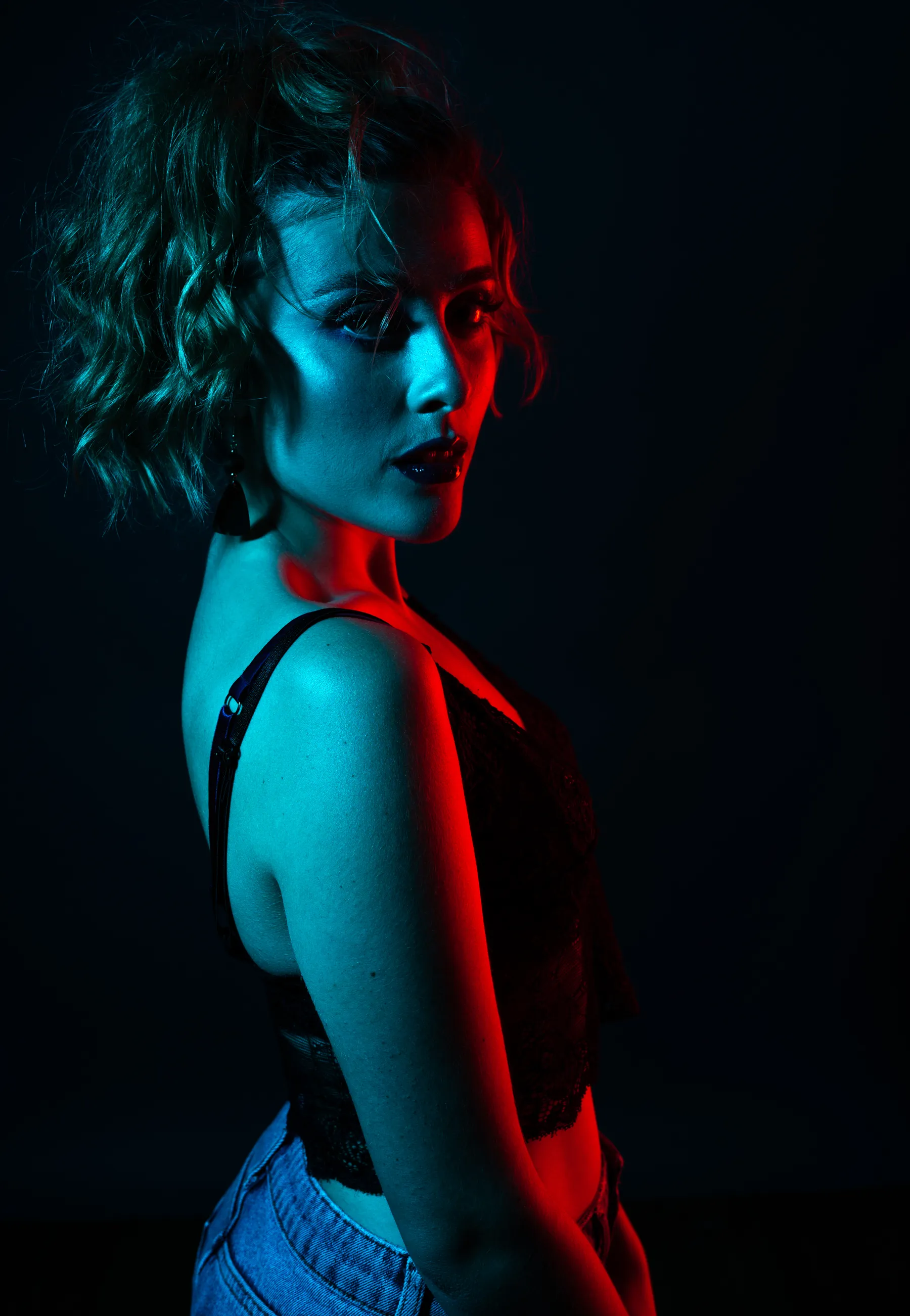 Portrait lit with red and cyan colour gels in Chris Cork's Maidstone studio