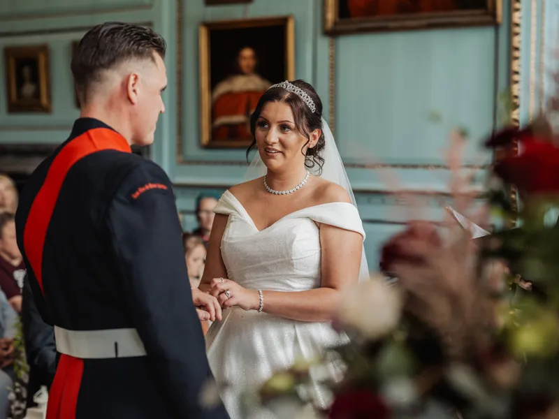 Ring exchange in the blue portrait room at Bradbourne House